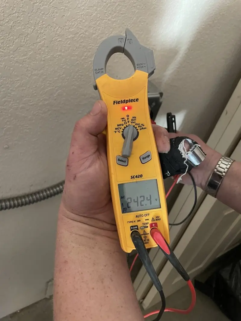 Voltage testing with clamp meter during Hot Tub / Pool Electrical Wiring in High Point